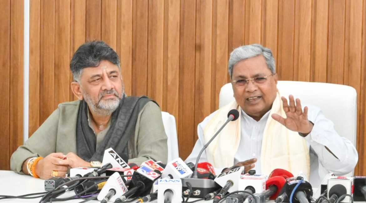 Siddaramaiah and D.K. Shivakumar unity gesture amid political tension