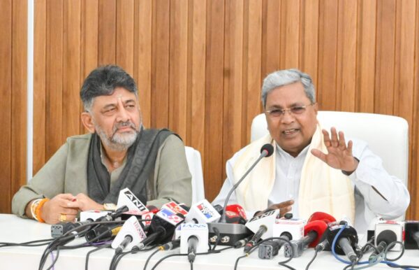 Siddaramaiah and D.K. Shivakumar unity gesture amid political tension