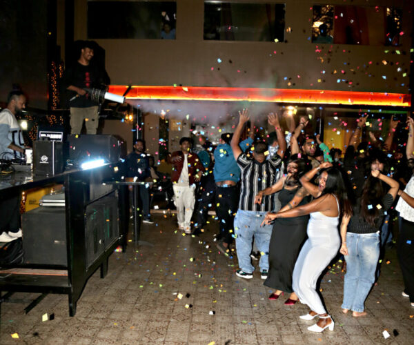 Up-close shot of signature cocktail being prepared at Budbee Restobar bar