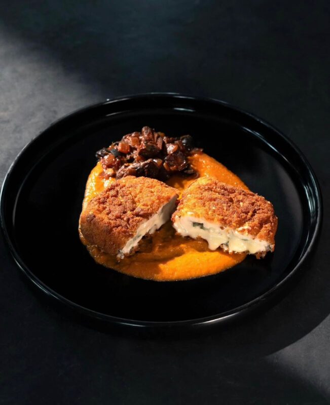 Famous wood-fired pizza at Pizza 4P's Bengaluru