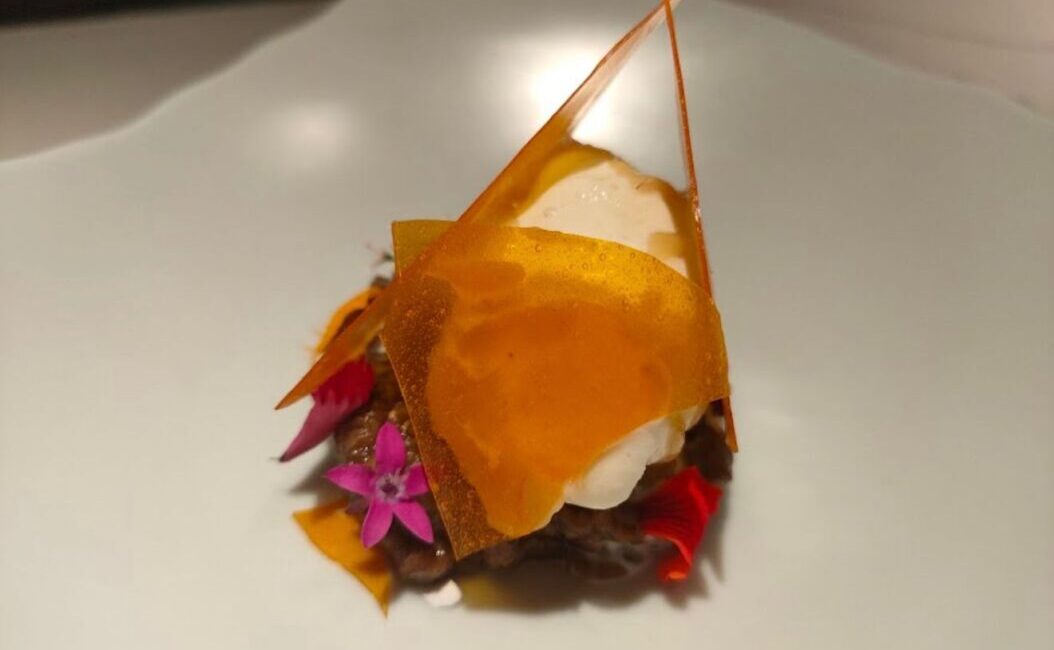 Farmlore Farm-to-Table Bangalore: A True Farm Fresh Dining Experience Chef plating a seasonal dish at Farmlore Bangalore