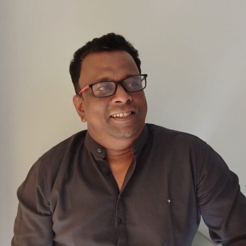 Sudheer Attavar New Movie Cast: Director Launches Search for Young Hero Director Sudheer Attavar during a film production meeting