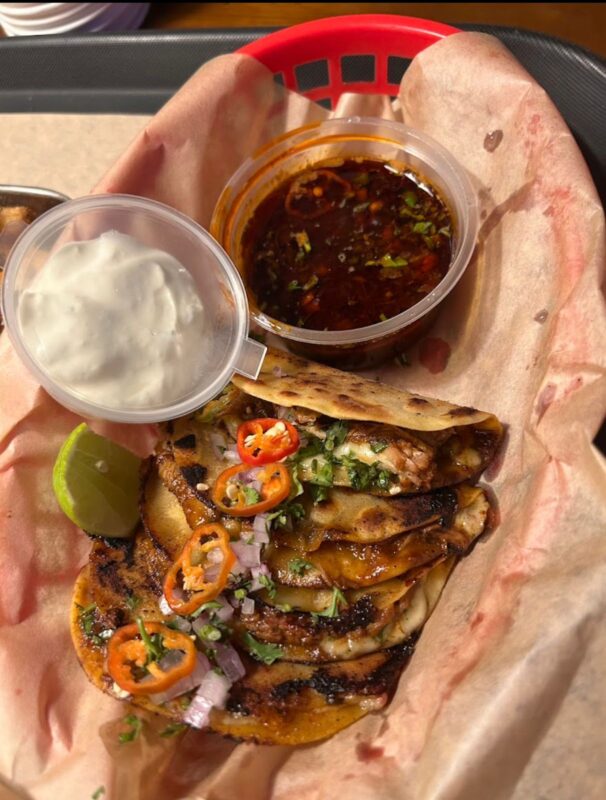 Guerilla Diner Bengaluru Burgers Tacos: An Underground Culinary Experience Rustic interior of Guerilla Diner with vinyl records and gorilla decor