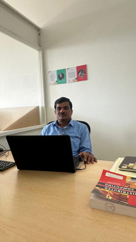 Dr Walikar mentoring students at a Smart India Hackathon event
