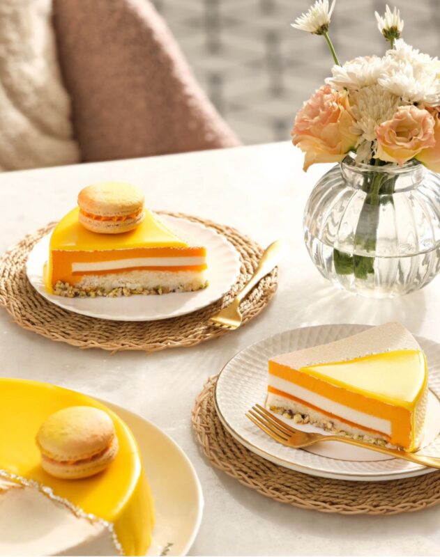 Amintiri Bengaluru Dessert Cafe: A Stylish Patisserie Experience on Museum Road Dessert display case with cakes and pastries at Amintiri