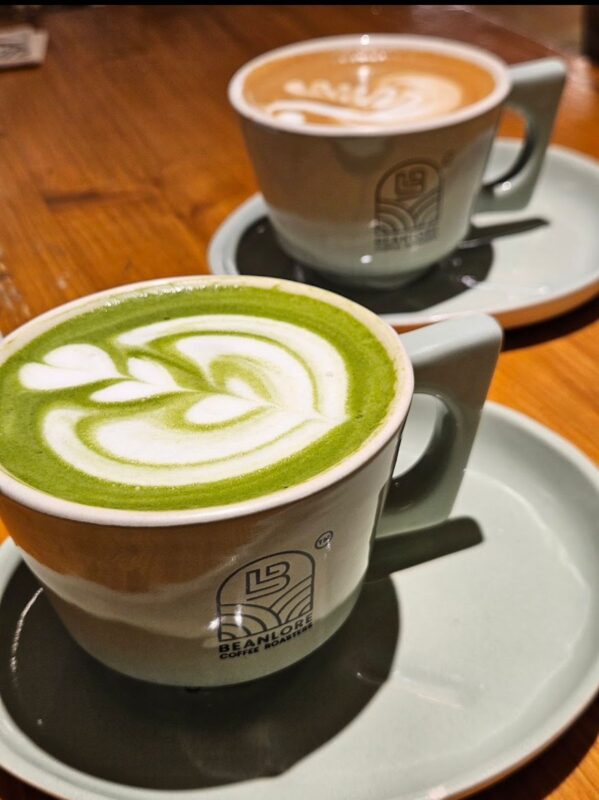 Beanlore Bengaluru Coffee Cafe: A Quiet Sanctuary for Handcrafted Brews & Calm Vibes Close-up of a cappuccino with latte art at Beanlore Bengaluru
