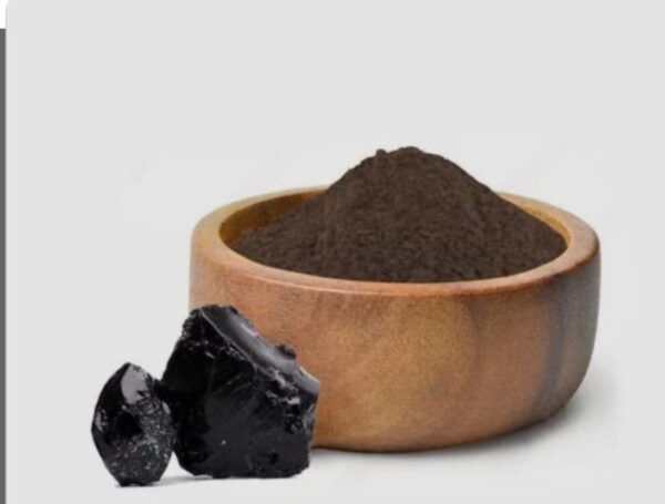 Shilajit resin in a traditional jar with a spoon