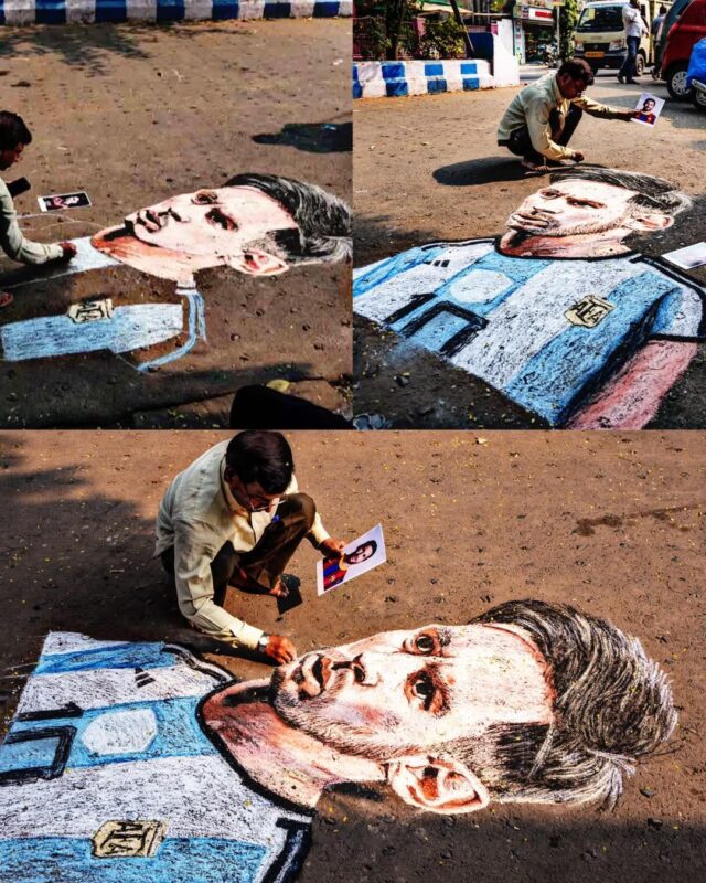 Lionel Messi waving to fans at an Indian airport arrival