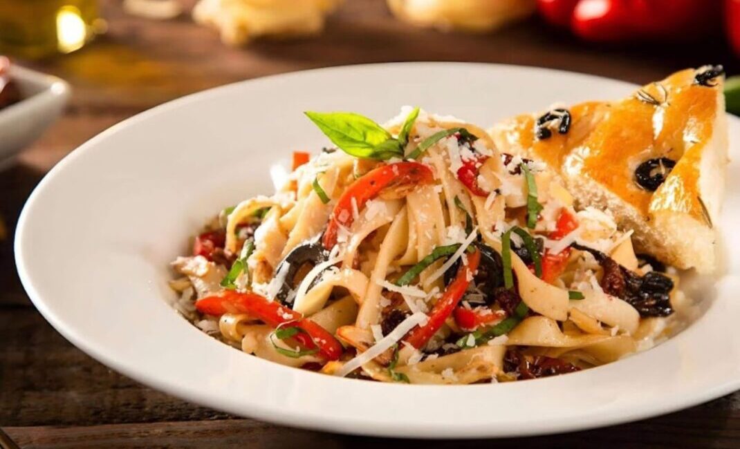 The Pizza Bakery Artisanal Pizza: Celebrating Simplicity & Quality in Every Slice Wood-fired pizza fresh out of the oven at The Pizza Bakery