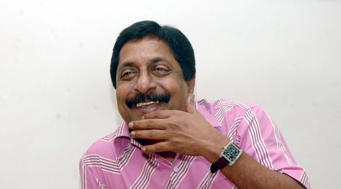 Veteran Sreenivasan Malayalam filmmaker in a classic pose from his acting career.