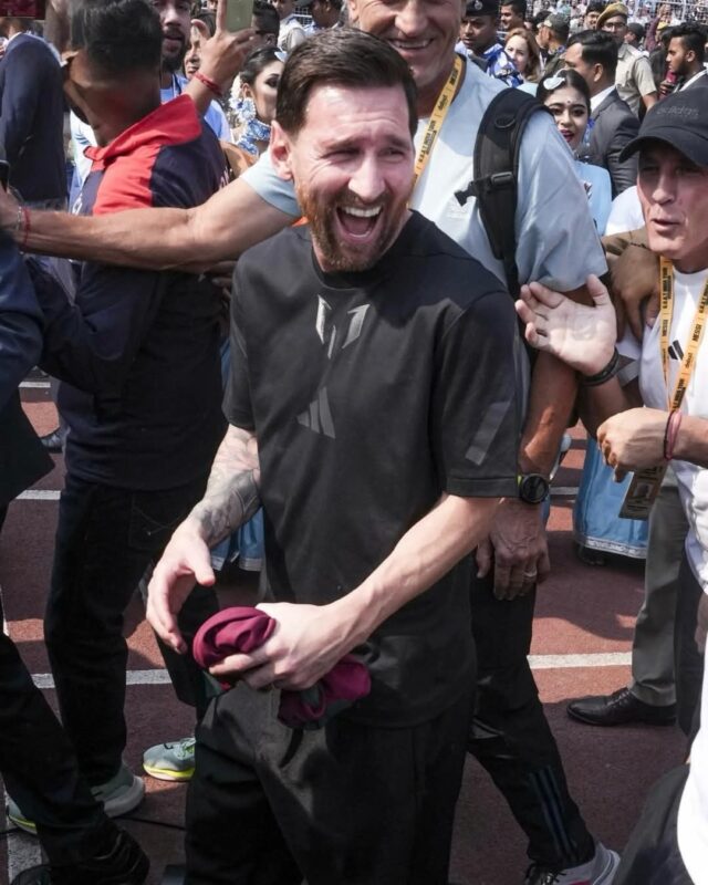 ₹89-Crore Goals, ₹11-Crore Tax: Messi’s India Tour Goes into Extra Time Lionel Messi surrounded by crowds and security during his chaotic India tour.