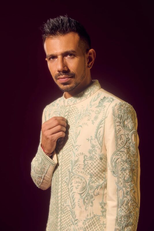 Chahal’s Luxury Leap: Star Spinner Turns Heads with Designer Style Collage of Yuzvendra Chahal's recent luxury fashion appearances and designer items.