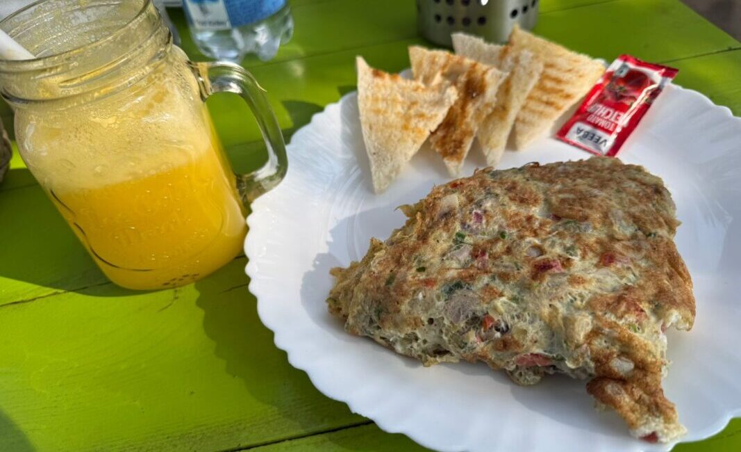 A hearty breakfast platter served at Silver Oak Cafe Nandi Hills.
