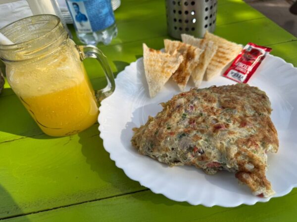 A hearty breakfast platter served at Silver Oak Cafe Nandi Hills.