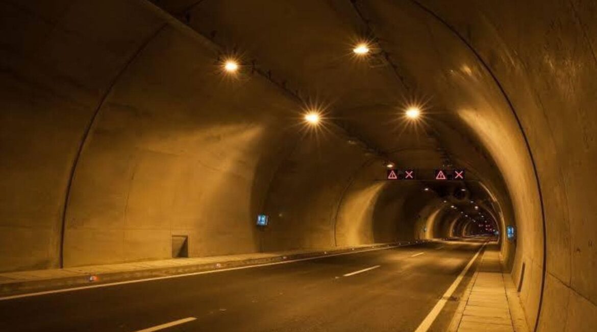 Adani Group Lowest Bidder for Bengaluru Tunnel Road Project Adani Group corporate logo alongside BBMP tender documents.