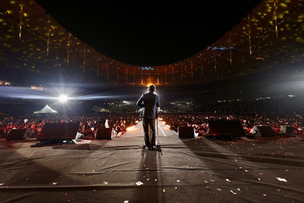 Jananayagan Audio Launch Malaysia Enters History Books with Record Crowd Close-up of actor Sapthagiri making his ₹2000-crore prediction for The Raja Saab.