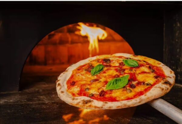 Nonna’s Italian Restaurant: Authentic Comfort Food in a Cozy Setting A cozy, warmly lit interior of Nonna’s Italian restaurant with wooden tables.