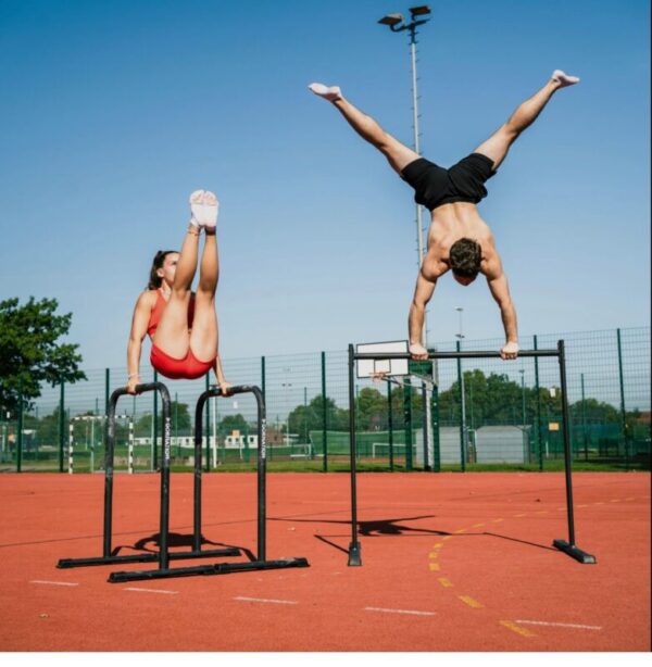 Calisthenics Workout: Bodyweight Training for Strength & Flexibility A person performing push-ups in a park during a calisthenics workout.
