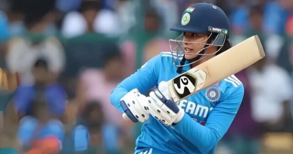 Smriti Mandhana Batting Elegance: The Modern Maestro’s Timeless Style Smriti Mandhana playing a classic cover drive, showcasing her batting elegance.
