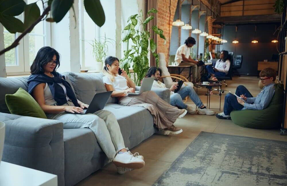 A modern co-working area inside a co-living facility in Bangalore, India.