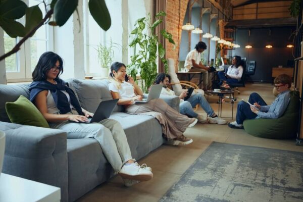 Co-Living Co-Working Spaces India: The Rise of Flexible Urban Hubs A modern co-working area inside a co-living facility in Bangalore, India.