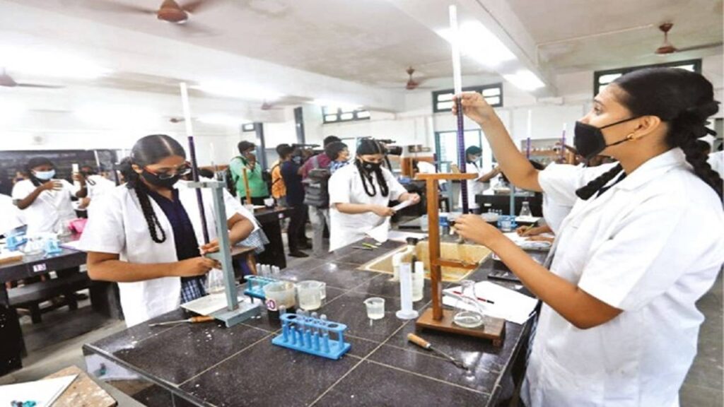 Karnataka 2nd PUC Practical Exams 2026: Livestreaming & CCTV Mandated A setup showing a laptop livestreaming a practical exam session in a college lab.