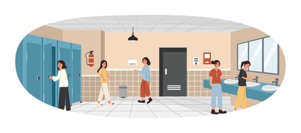 A police officer at the theatre, carrying evidence related to the hidden camera investigation.