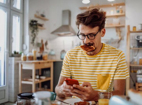 Eat Don't Shoot Mindful Eating: A Principle for Digestive and Emotional Wellness A person practicing eat don't shoot mindful eating, focused solely on their meal without a phone.