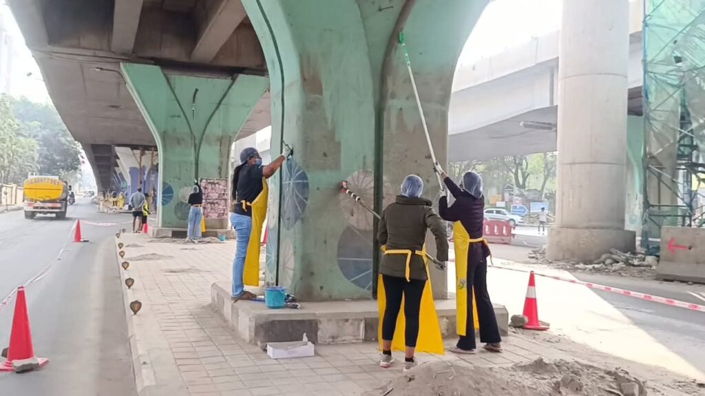 Students from Beyond8 painting a footpath during the St John’s Church Road clean-up drive.