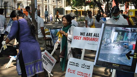 St John’s Church Road Student Clean-Up Drive Brightens Bengaluru's Streets A group of student volunteers posing with cleaning supplies on St John’s Church Road.