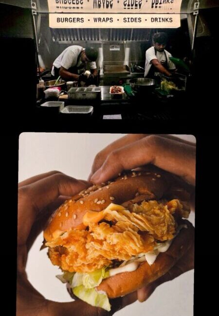 Kried Food Truck Bengaluru: JP Nagar's Go-To for Crispy Fried Chicken A customer enjoying a Kried chicken burger with fries from the food truck.