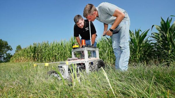 A student at UAS Bengaluru working on a precision agriculture or farm machinery project.