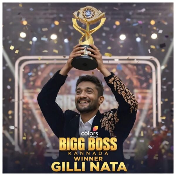 Gilli holding the Bigg Boss 15 winner's trophy on the grand finale stage.