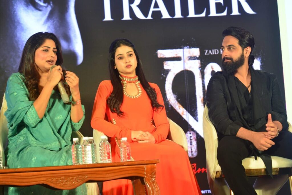 Director Anil Kumar with the cast (Zaid Khan, Rachita Ram, Malaika) at a promotional event.